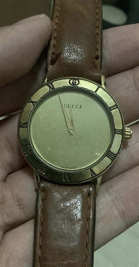 gucci watch identification check